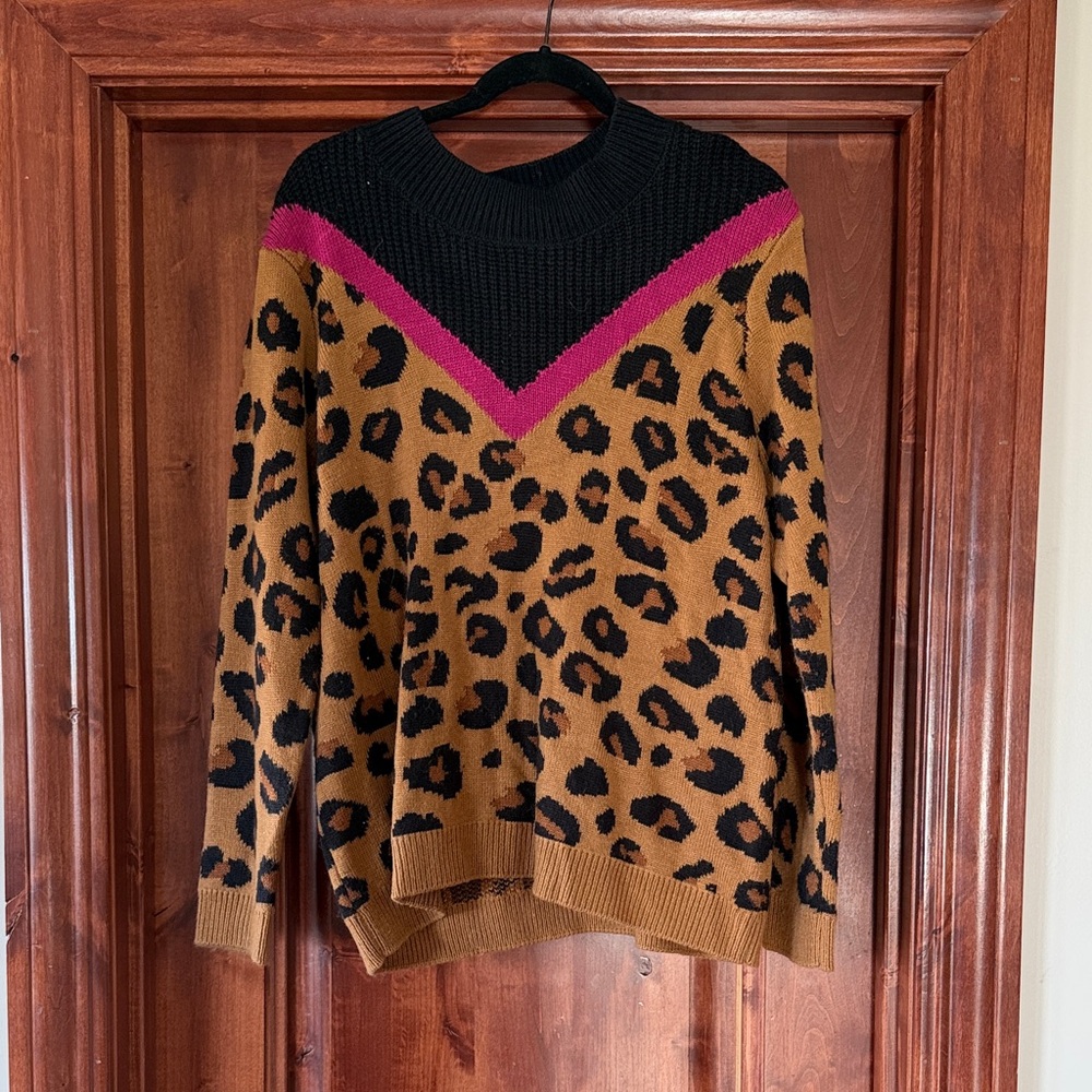 Stylish Leopard Print Sweater with Black and Pink Details